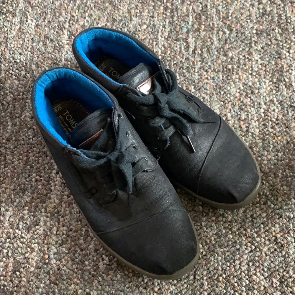 Tom’s botas